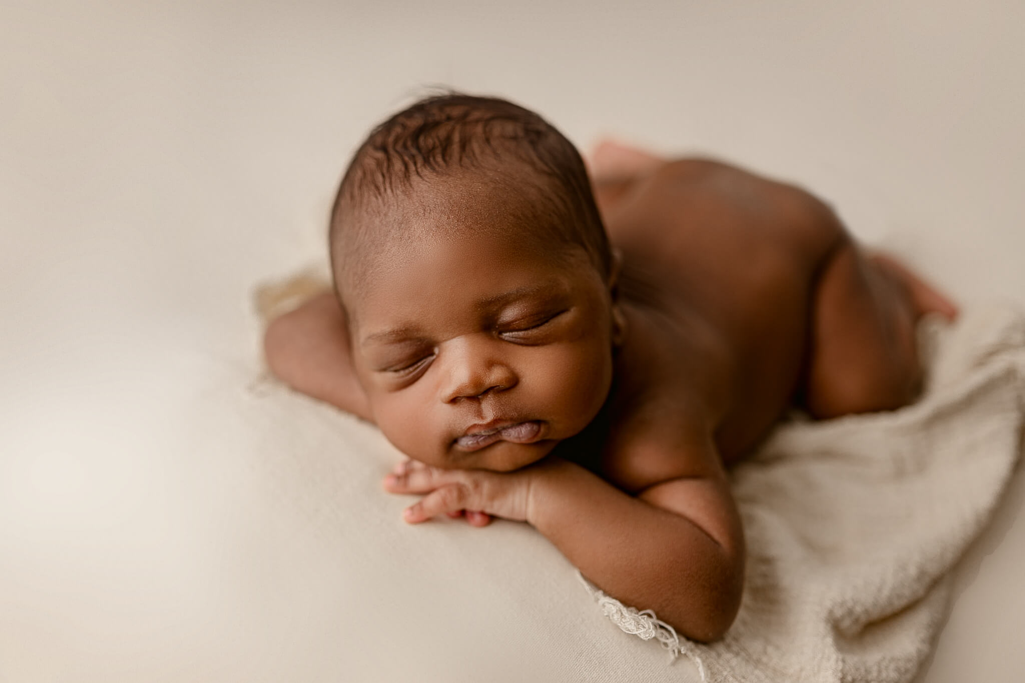 Newborn boy posed sleeping after Atlanta Birthing Center Visit. 
