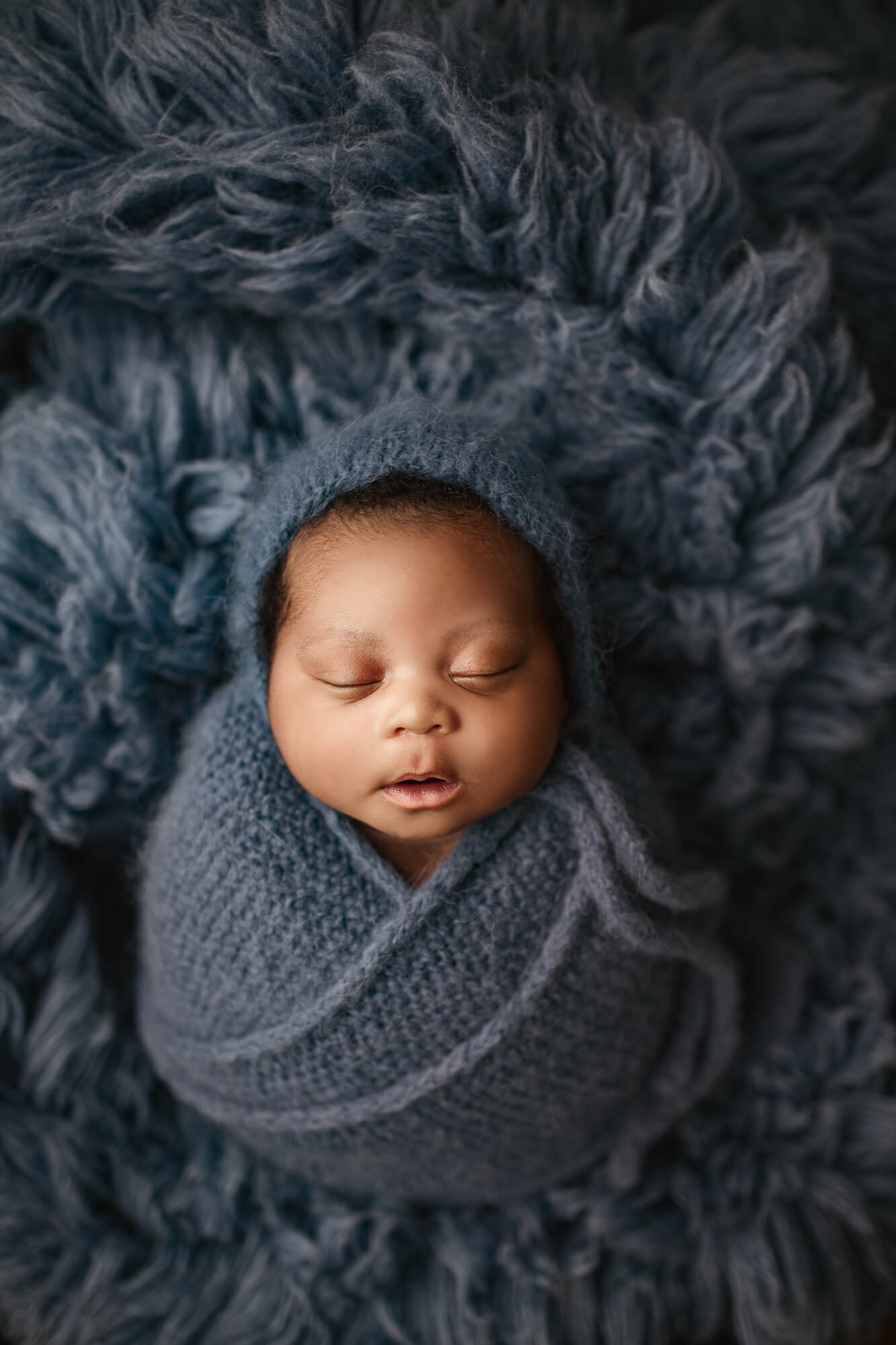 atlanta newborn baby wrapped in blue