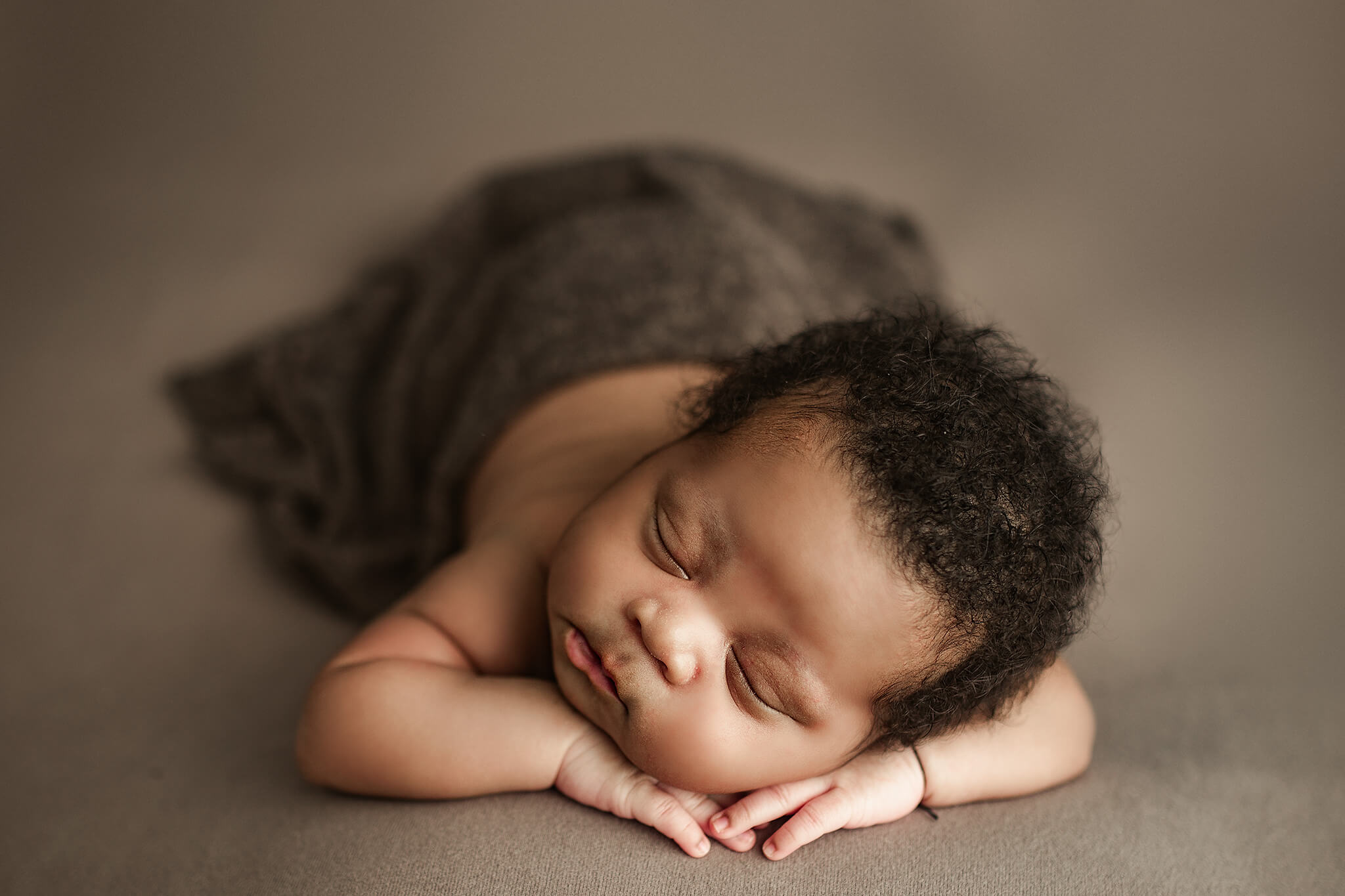 newborn boy asleep during baby session